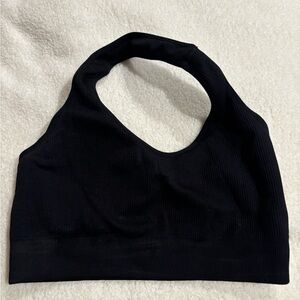 Black NVGTN halter sports bra